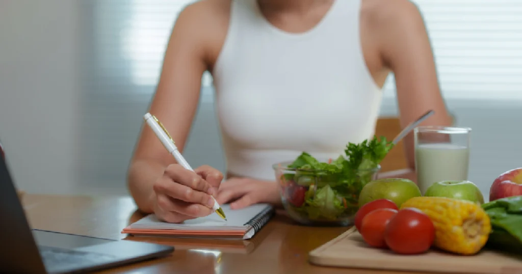 Female wellness practitioner providing personalized care and support to a client, symbolizing holistic wellness services in St. Peters, MO.
