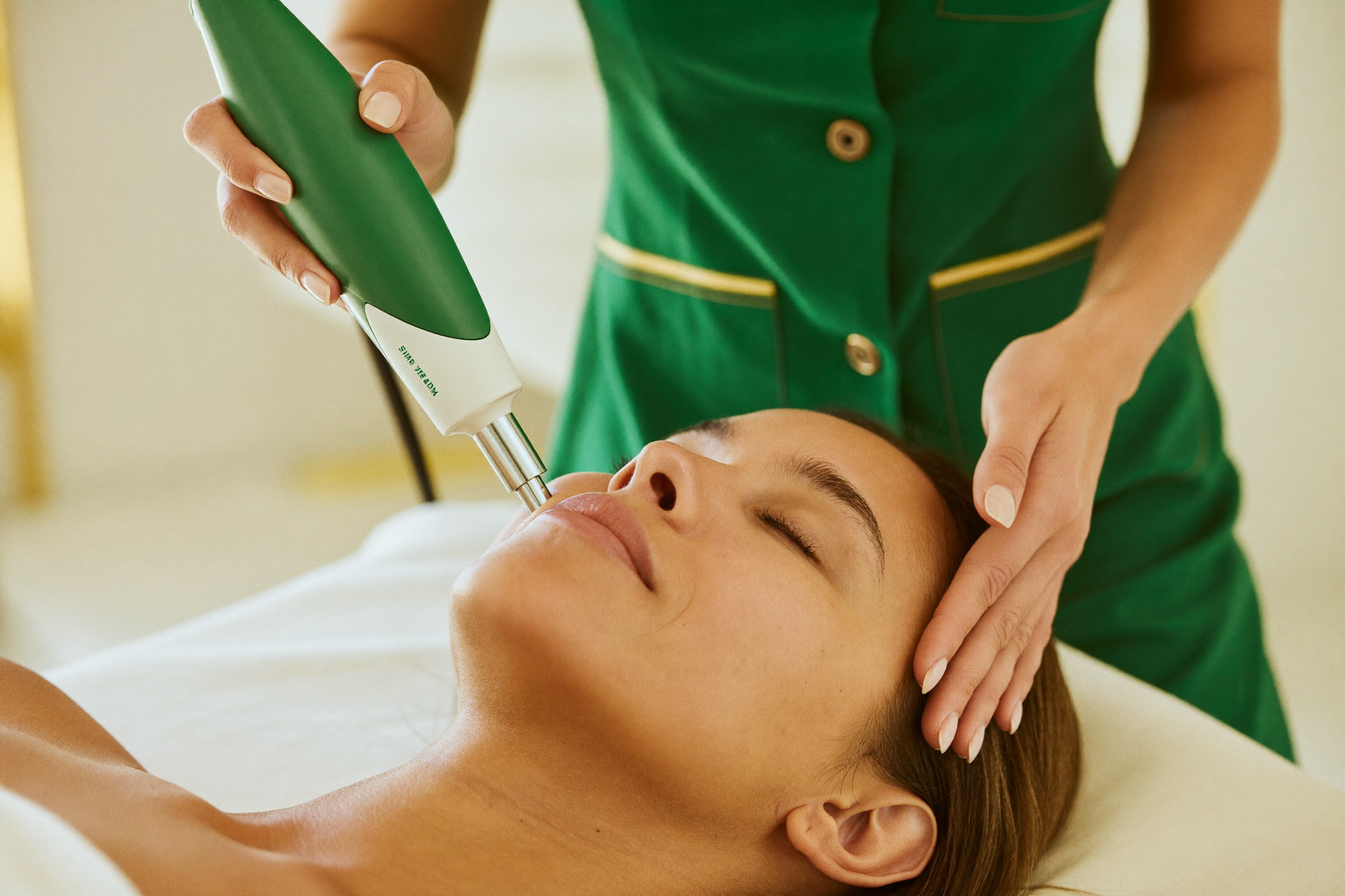 Esthetician performing microdermabrasion at The Whole You Wellness Center in St. Peters, MO