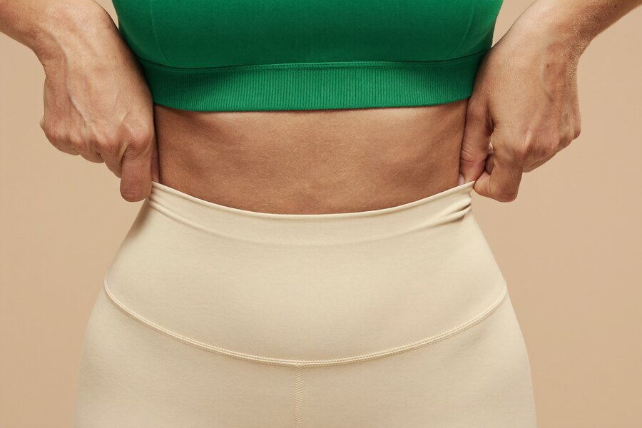 Close view of a treated midsection area illustrating localized fat reduction with Lipodissolve